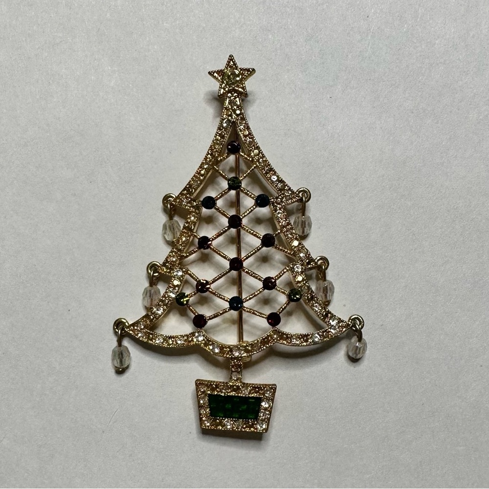 Vintage gold tone and rhinestone Avon Christmas‎ tree brooch pin